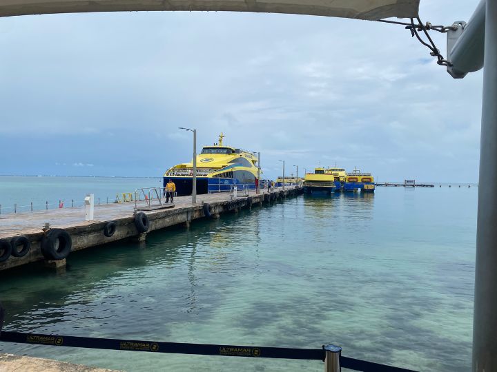 digital nomad on ferry to the Isla Mujeres